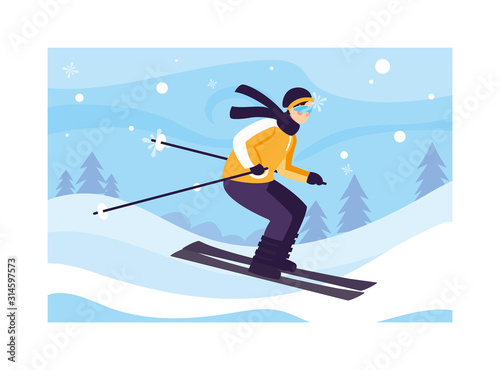 man with mountain ski in landscape with snowfall