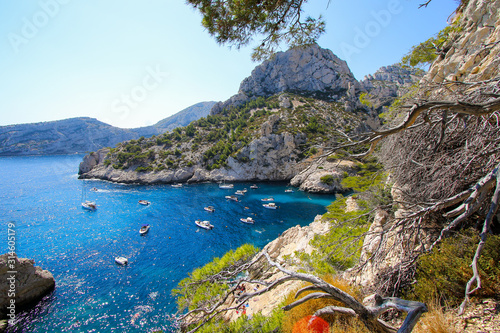 Turquoise waters in the Calanque de Sugiton - Mountains on the coast of Provence in the Mediterranean Sea near Marseille, France photo