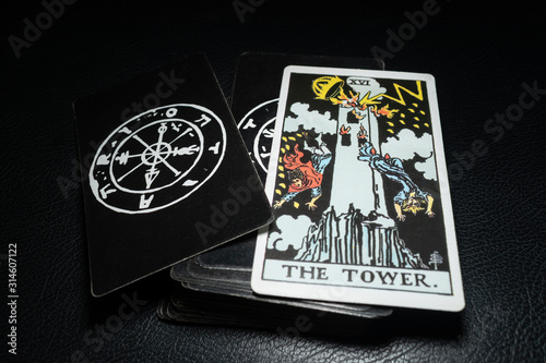 Ubonratchathani,Thailand, December 19 : View of tarot card name The Tower on the table. Dark tone, on December 19, 2019, Ubonratchathani, Thailand.