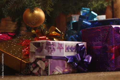 Christmas presents down the tree closeup