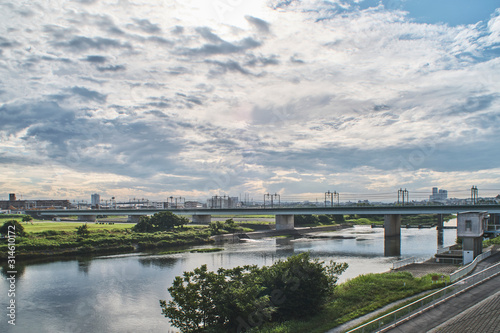 Cloudy sky and subway bridge.