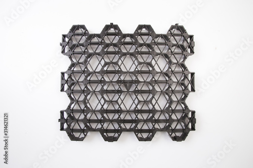 The design of the slope. Plastic black honeycomb frame filled