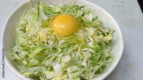 Egg on some chopped cabbage
