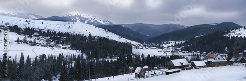 Winter scenery in Carpathians, (Ukraina) with ski piste and lots of snow