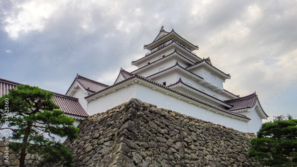 Fototapeta premium Aizu-Wakamatsu Castle, aka Tsuruga Castle. A concrete replica of a traditional Japanese castle, at the center of the city of Aizuwakamatsu, in Fukushima Prefecture, Japan