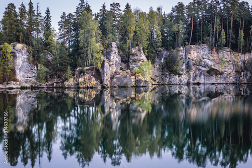 Fototapeta Naklejka Na Ścianę i Meble -  Rocks over lake in Adrspach Rocks, part of Adrspach-Teplice landscape park in Broumov Highlands region of Czech Republic