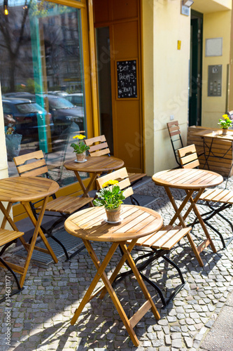 european restaurant - tables and chairs on the street