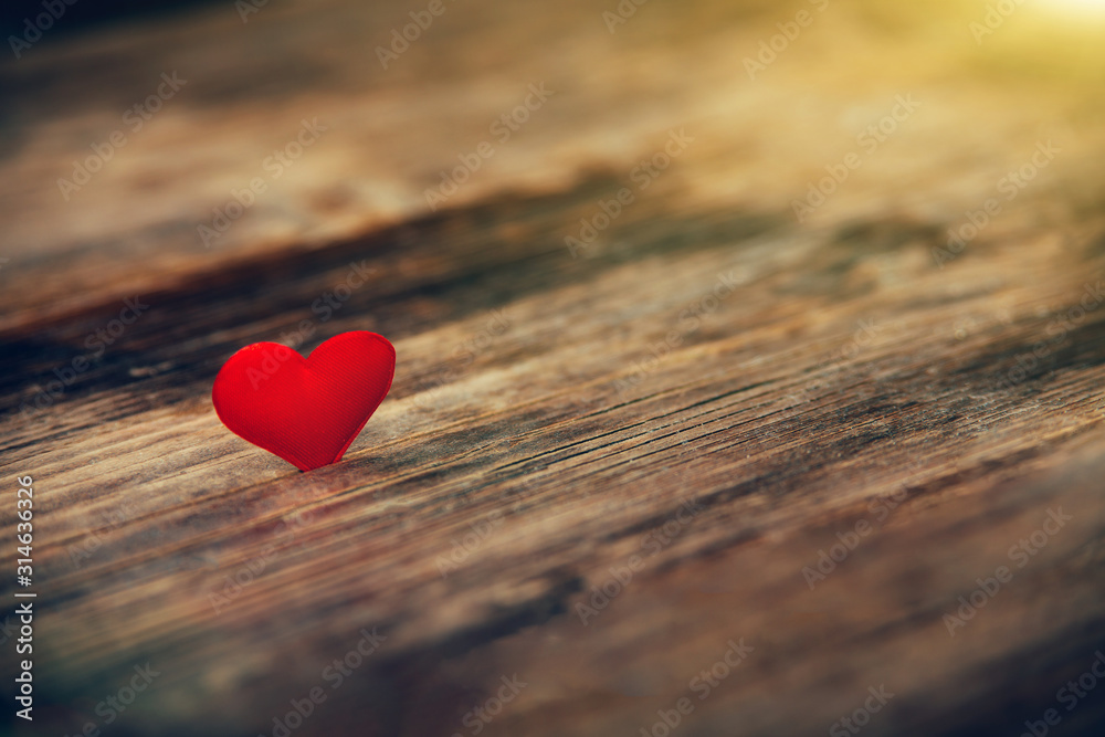 Valentines Day background with red hearts in the sun Valentines Day background with red hearts in the sun