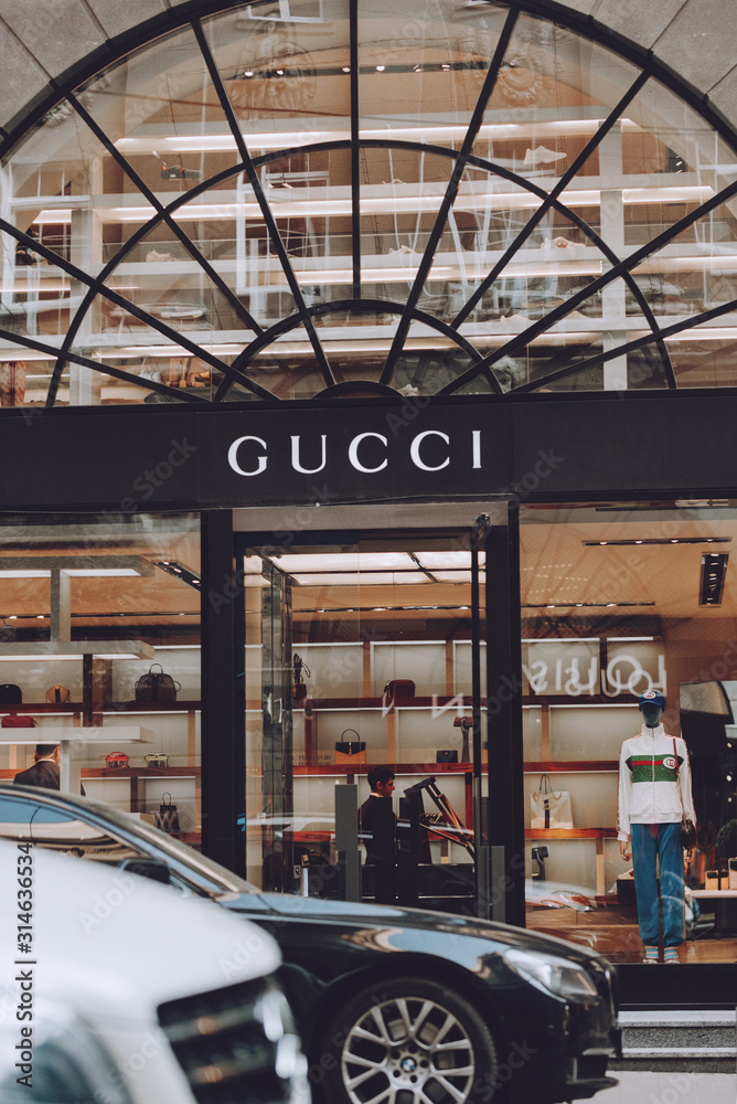 Gucci boutique. Signboard logo brend sign of Gucci on store, shop, mall,  boutique. Kiev, Ukraine - September 02, 2019 Stock Photo | Adobe Stock