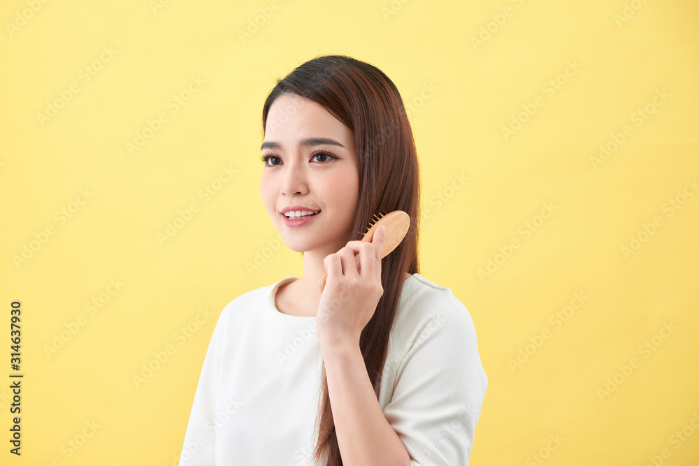Concept of healthy good hair. Pretty beautiful charming woman with beaming smile Concept of healthy good hair. Pretty beautiful charming woman with beaming smile