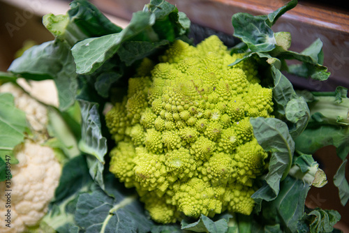 Vegetables from organic farming. Romanesco cauliflower, with background of cardboard box