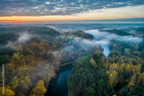 Foggy river at sunrise  view from above