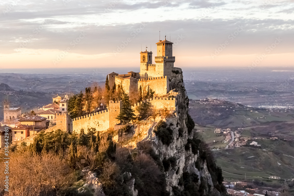 Fortress of Guaita in San Marino, one of three peaks on Monte Titano, the First Tower in San Marino on the sunset - Image