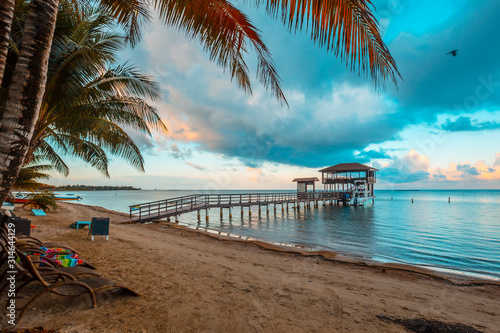 Roatán, Honduras »; January 2020: Sunrise from the window at Sandy Bay beach on Roatán Island photo
