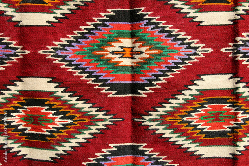 Texture traditional wool carpet with geometric pattern in arabic style, Albania