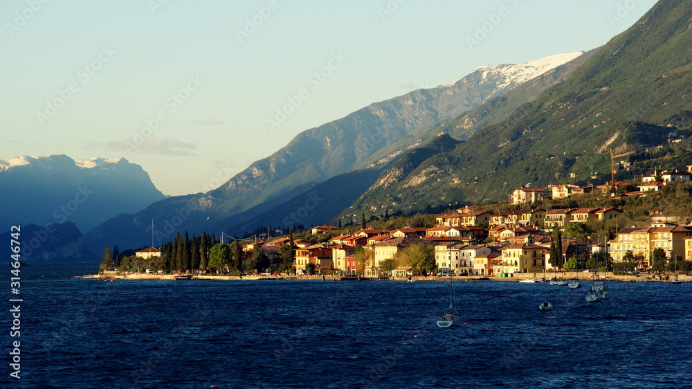 Idyllic village (Brenzone) on lake Garda (Italy) in evening light