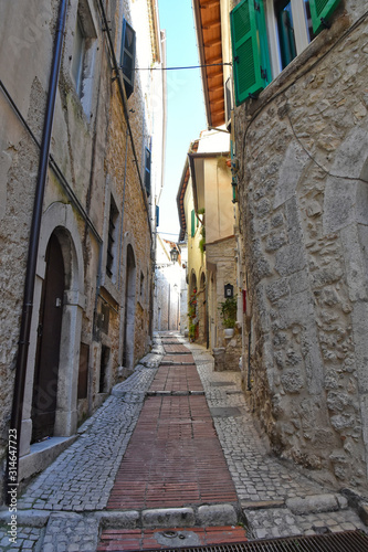 Veroli, Italy, 01/03/2020. A narrow street between the old houses of a medieval village © Giambattista