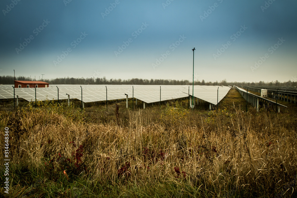 Sun batteries energy stands in the field Sun batteries energy stands in the field