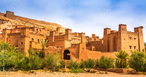 Amazing view of Kasbah Ait Ben Haddou near Ouarzazate in the Atlas Mountains of Morocco. UNESCO World Heritage Site since 1987. Artistic picture. Beauty world. photo