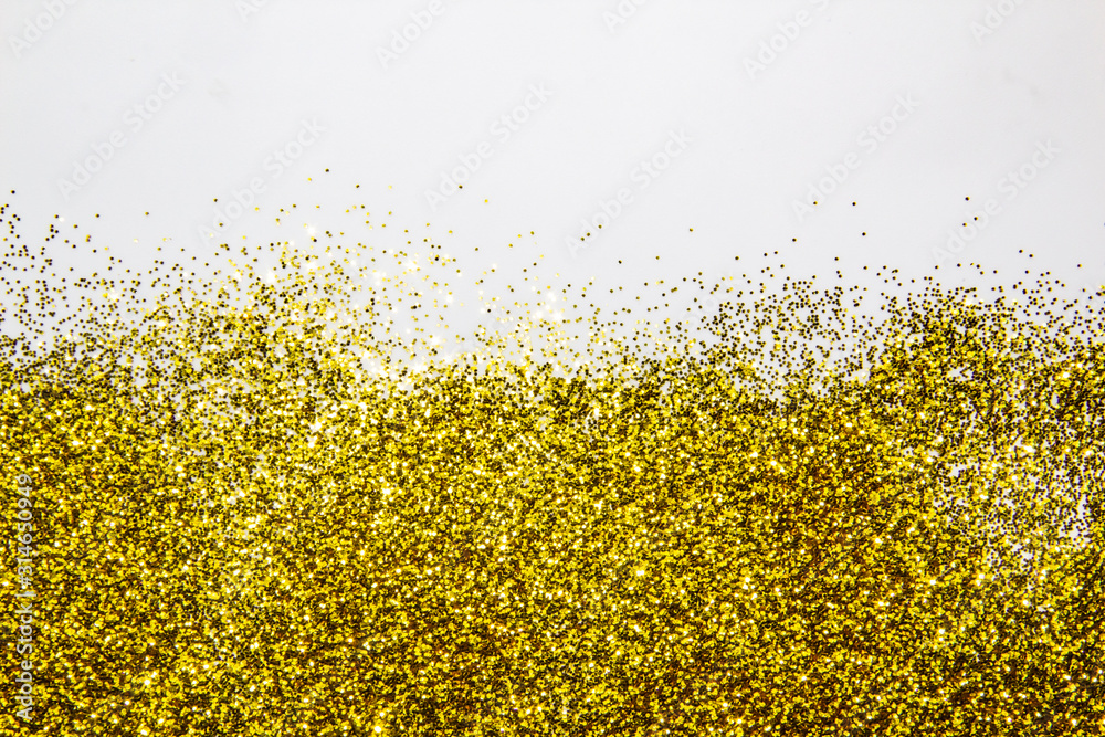 a composition with  beautiful gold glitter. Background and texture of gold glitter. Luxury gold glitter sparkle shining texture background