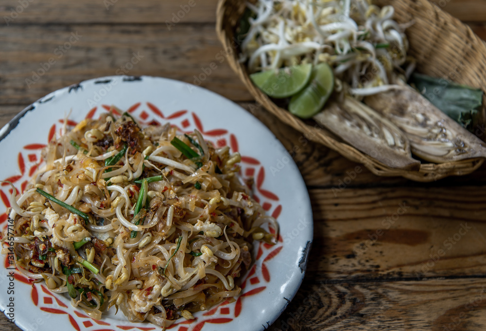Popular Thai fried local Korat noodle with cube tofu and shrimp, call Pad Mee Korat, Korat Stir fried Rice Noodle. Popular Thai fried local Korat noodle with cube tofu and shrimp, call Pad Mee Korat, Korat Stir fried Rice Noodle.