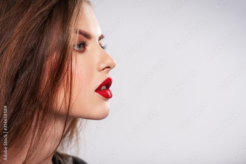 Premium Photo  Portrait brunette girl with red lips wearing a