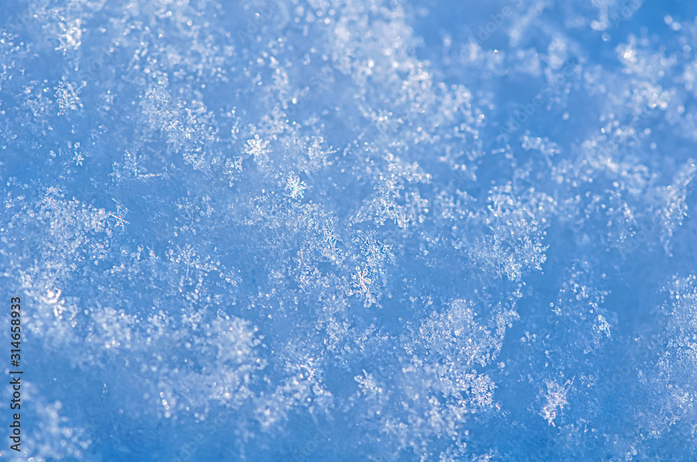 Lots of beautiful winter snowflakes in the sun Lots of beautiful winter snowflakes in the sun