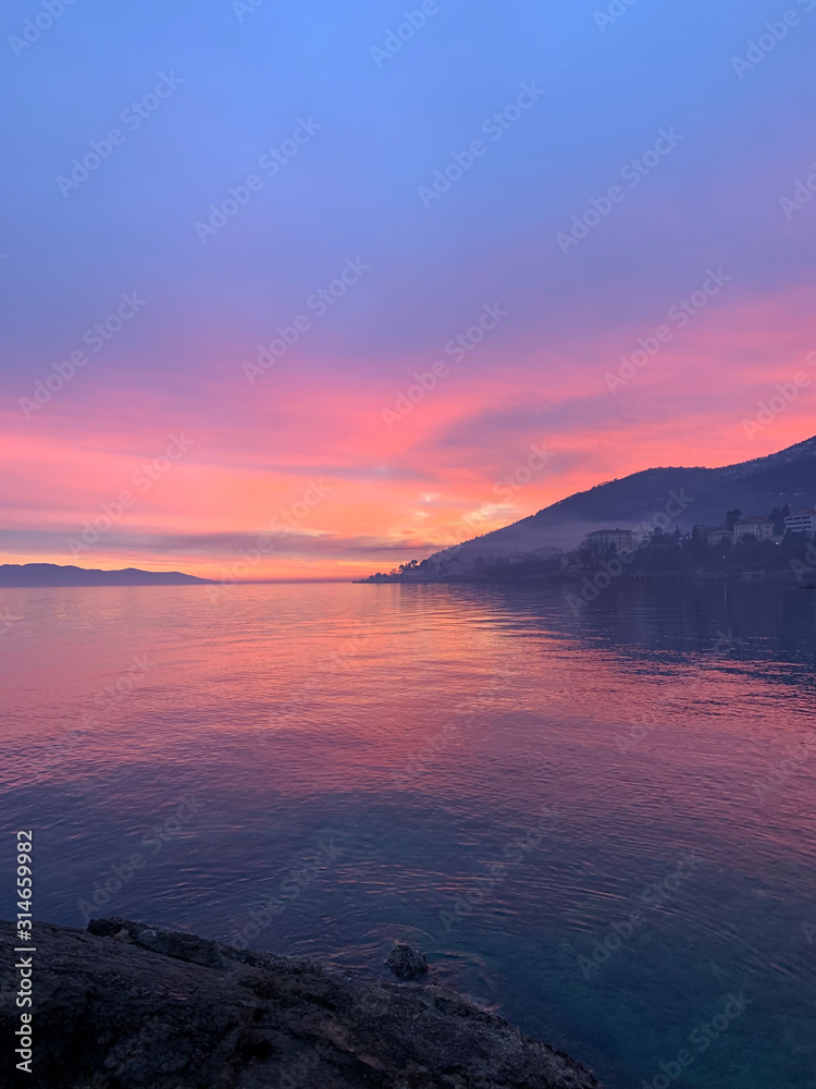 Fototapeta premium Natural colors of the sunset by the sea