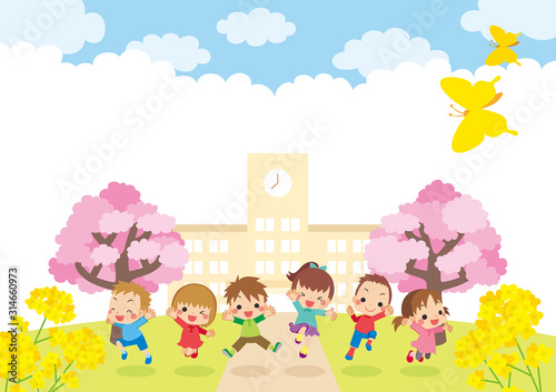 桜咲く春の小学校の前で元気にジャンプするキッズ