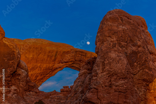 Panoramic picture of impressive sandstone formations in Arches National Park at night in winter