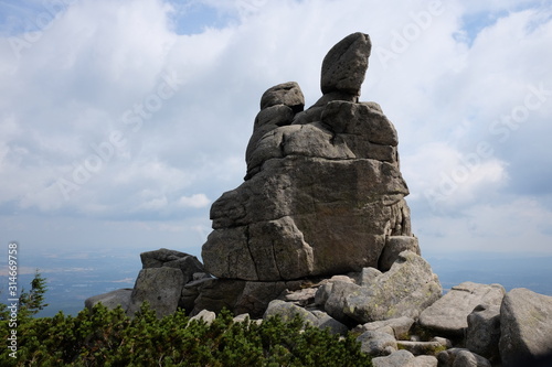 Stone with 2 heads on the highest mountain Sněžka in Czech Republic