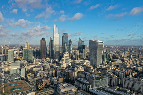 London city centre aerial panorama view  financial district  Thames river  Belfast  skyscrappers  warf and buildings and St. Pauls Cathedral  Tower Bridge and The Tower
