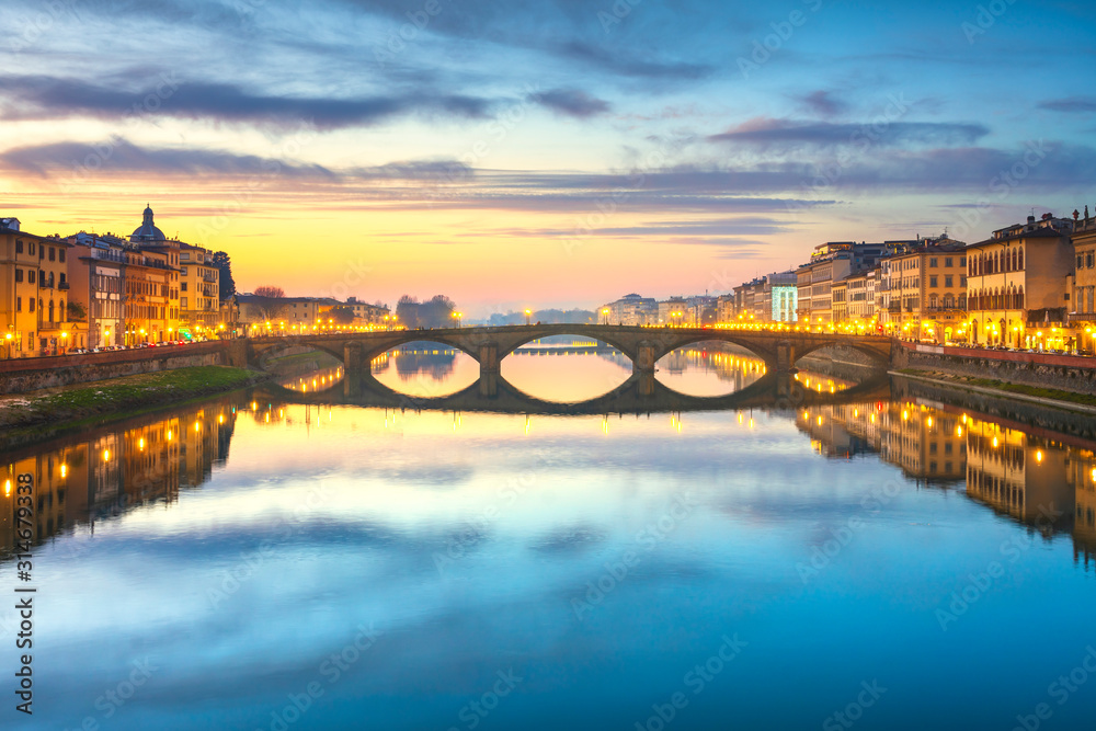 Carraia medieval Bridge on Arno river at sunset. Florence Italy