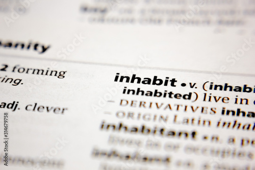 Word or phrase inhabit in a dictionary. photo