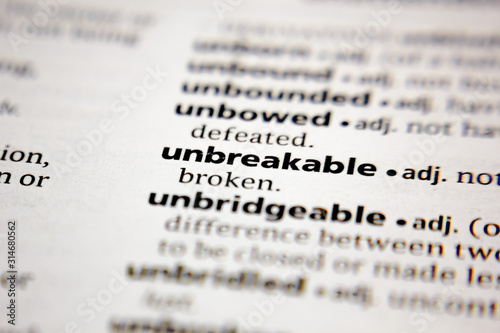 Word or phrase unbreakable in a dictionary.
