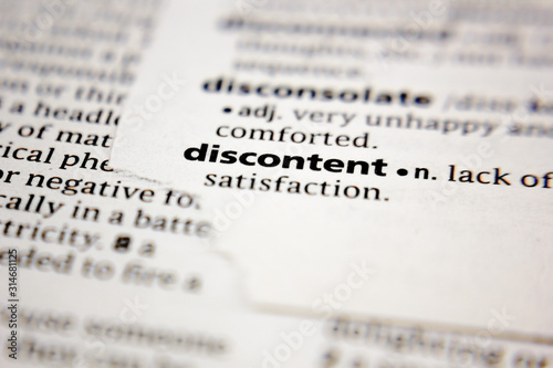 Word or phrase discontent in a dictionary. photo