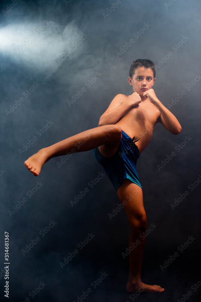 Obraz premium Young boy doing crazy photo session