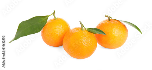 Fresh ripe juicy tangerines isolated on white