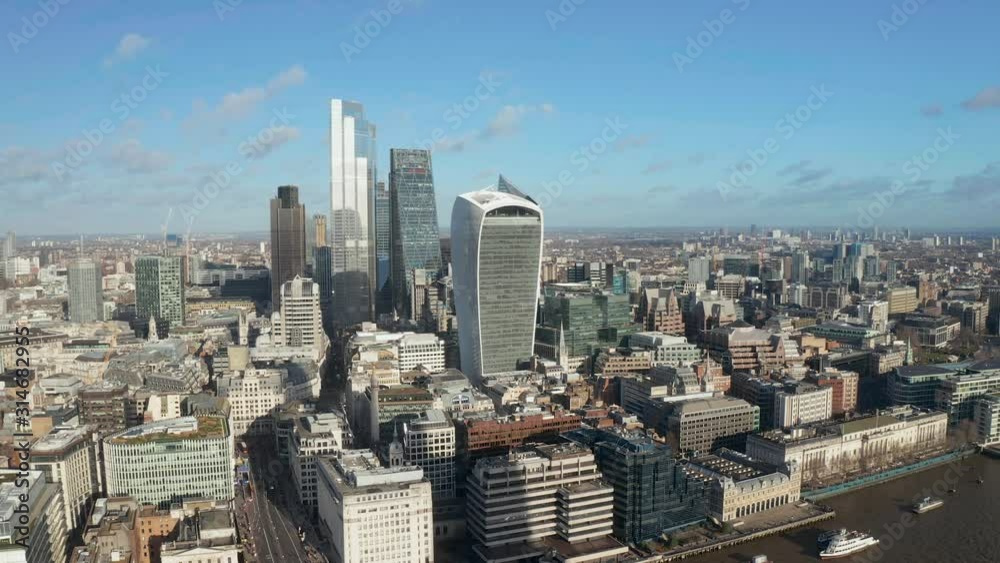 London city centre aerial panorama view: financial district, Thames river, Belfast, skyscrappers, warf and buildings and St. Pauls Cathedral, Tower Bridge and The Tower London city centre aerial panorama view: financial district, Thames river, Belfast, skyscrappers, warf and buildings and St. Pauls Cathedral, Tower Bridge and The Tower