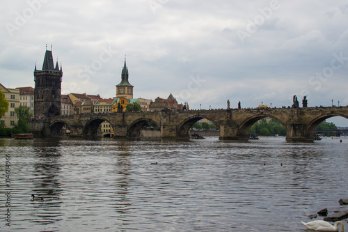 Vltava river flowing through Prague with Charles Bridge (Karlův most) and Old Town Bridge Tower (Staroměstská mostecká věž) at the background (Czech Republic) © Jesus Barroso