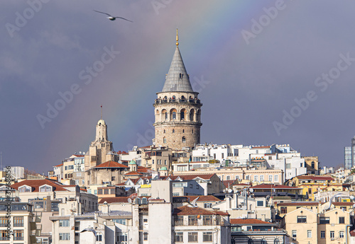 Galata Tower or Galata Kulesi in Istanbul after Rain with Rainbow on Sky, Turkey