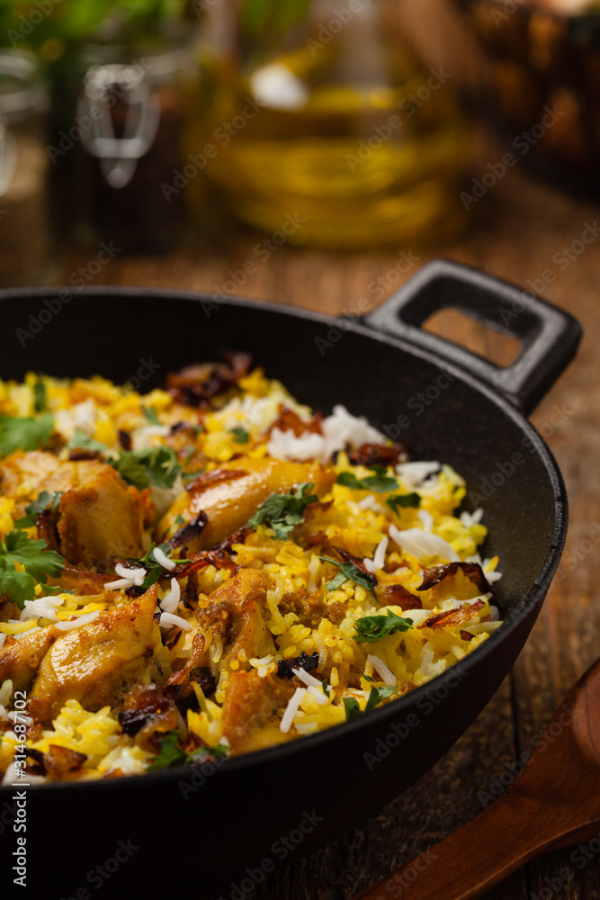 Biryani with chicken. Traditional Indian dish of rice and chicken marinated in spices and yoghurt.