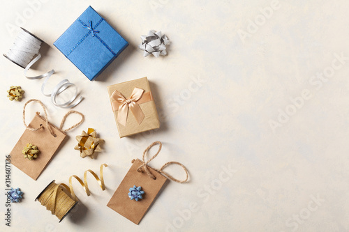 Gift Wrapping. A bright background with packaging accessories and gifts. Creative composition. Place for description. Top view.