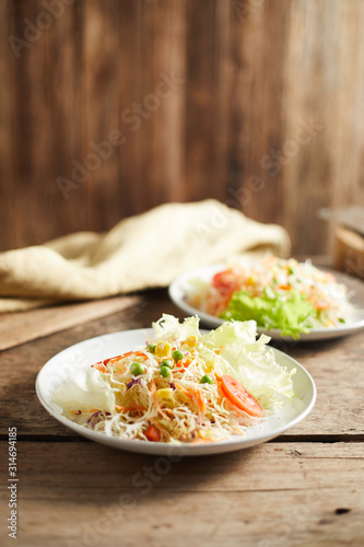 Fresh vegetable mixed salad on plate. .