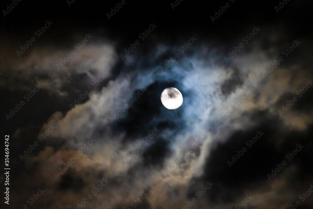 Full moon with clouds, Wolf Moon in January