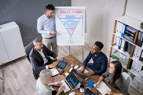 Manager Giving A Presentation To Staff