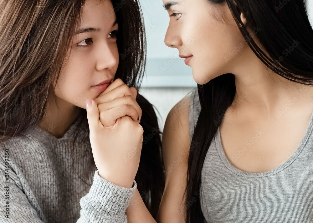 The beautiful woman looking eyes together,and kiss hands her couple,with loved feeling,romantic couple, The beautiful woman looking eyes together,and kiss hands her couple,with loved feeling,romantic couple,