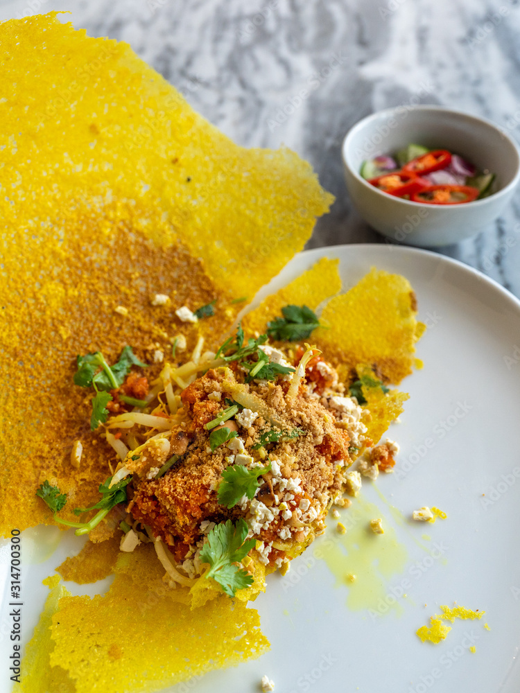 Fotografie Vietnamese stuffed omelette on the rock table