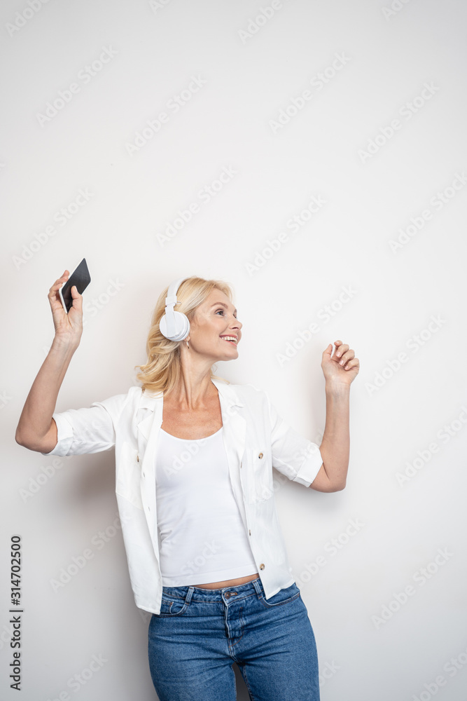 Cheerful pretty female enjoying her spare time Cheerful pretty female enjoying her spare time