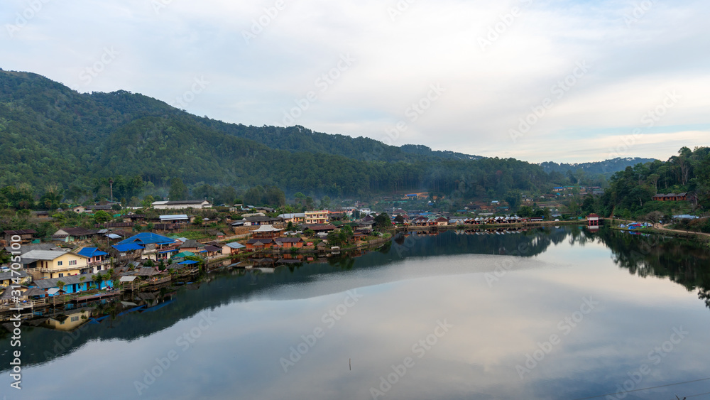 Landscape view with reflexion in the lake at Ban Rak thai village in Mae Hong Son Thailand.
